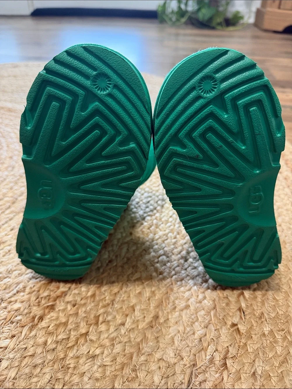 UGG Kids' Classic Short II boots in a  emerald green genuine shearling lining.